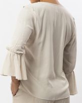 blusa-viscose-frente-babados-e-punho-flare-amarula-bt62560825_783-03